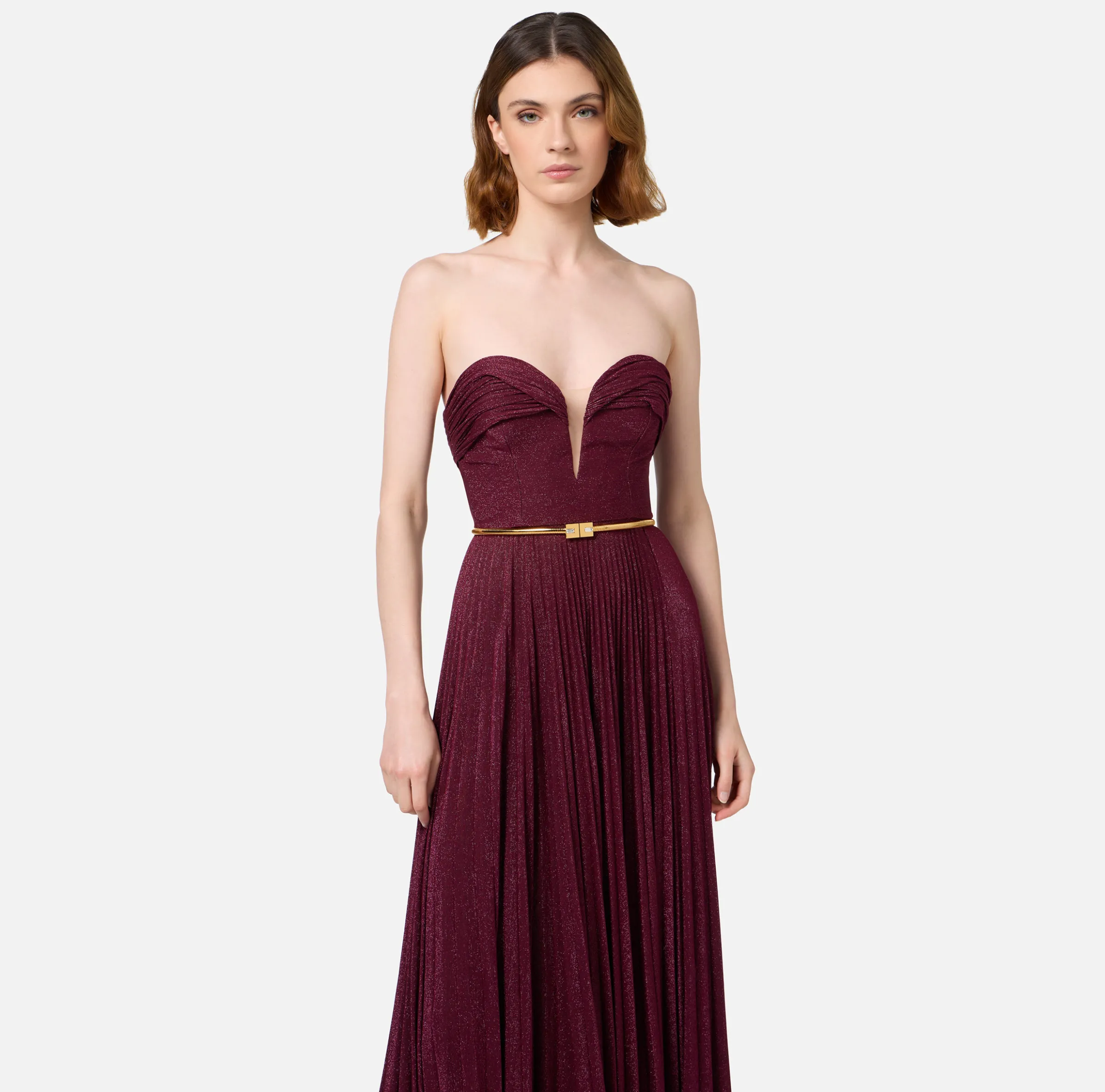 Abito red carpet in jersey lurex plissettato con cintura