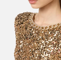 Abito red carpet in paillettes con catena e strass