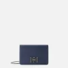 Borsa a tracolla con girello logo in metallo