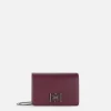 Borsa a tracolla con girello logo in metallo