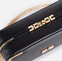 Borsa a tracolla in materiale effetto pelle con angoli in metallo