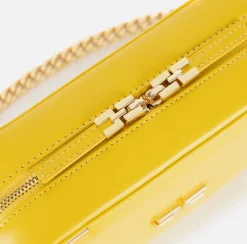 Borsa a tracolla in materiale effetto pelle con angoli in metallo