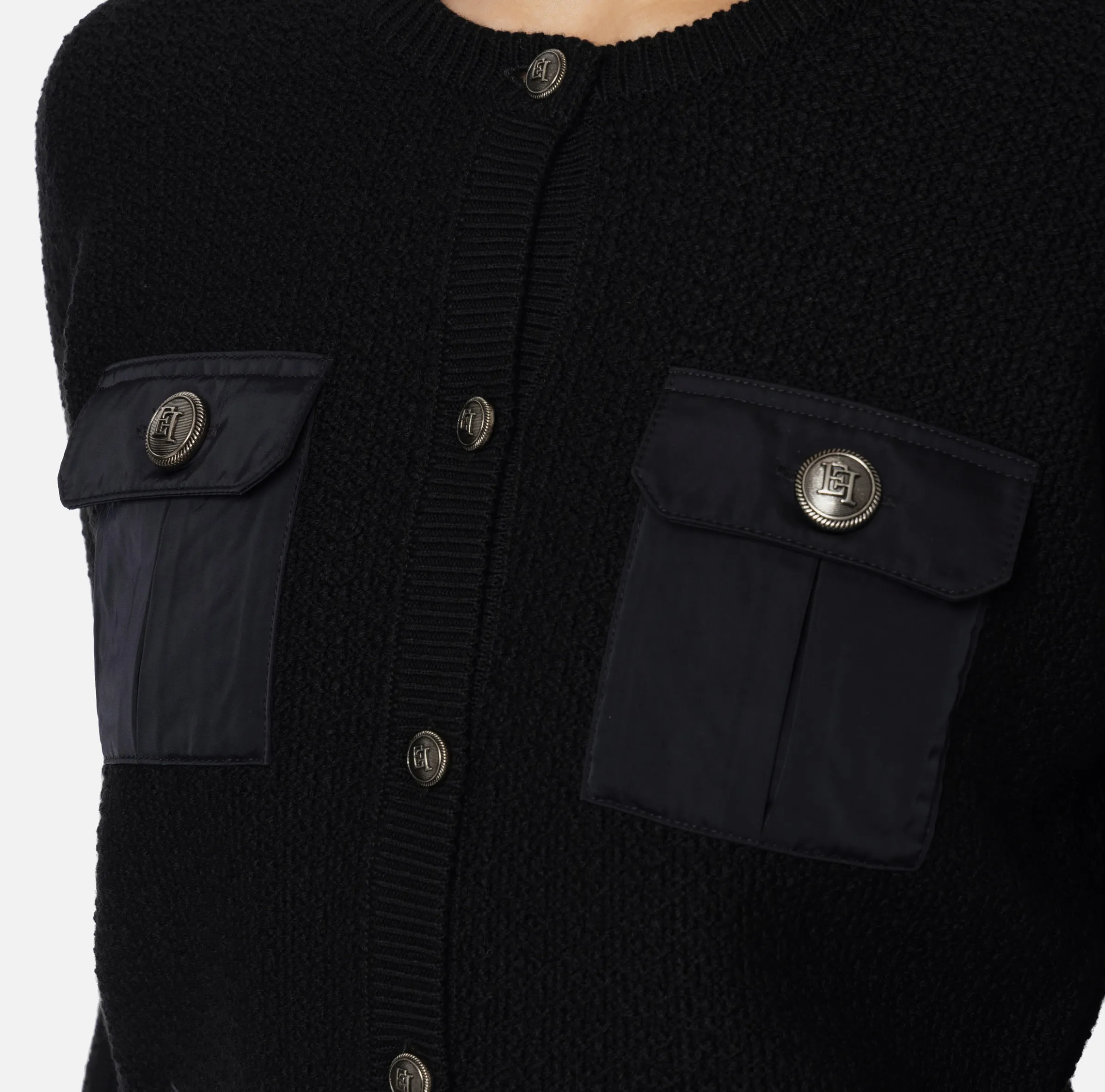 Cardigan in lana bouclé con tasche in vela tecnica