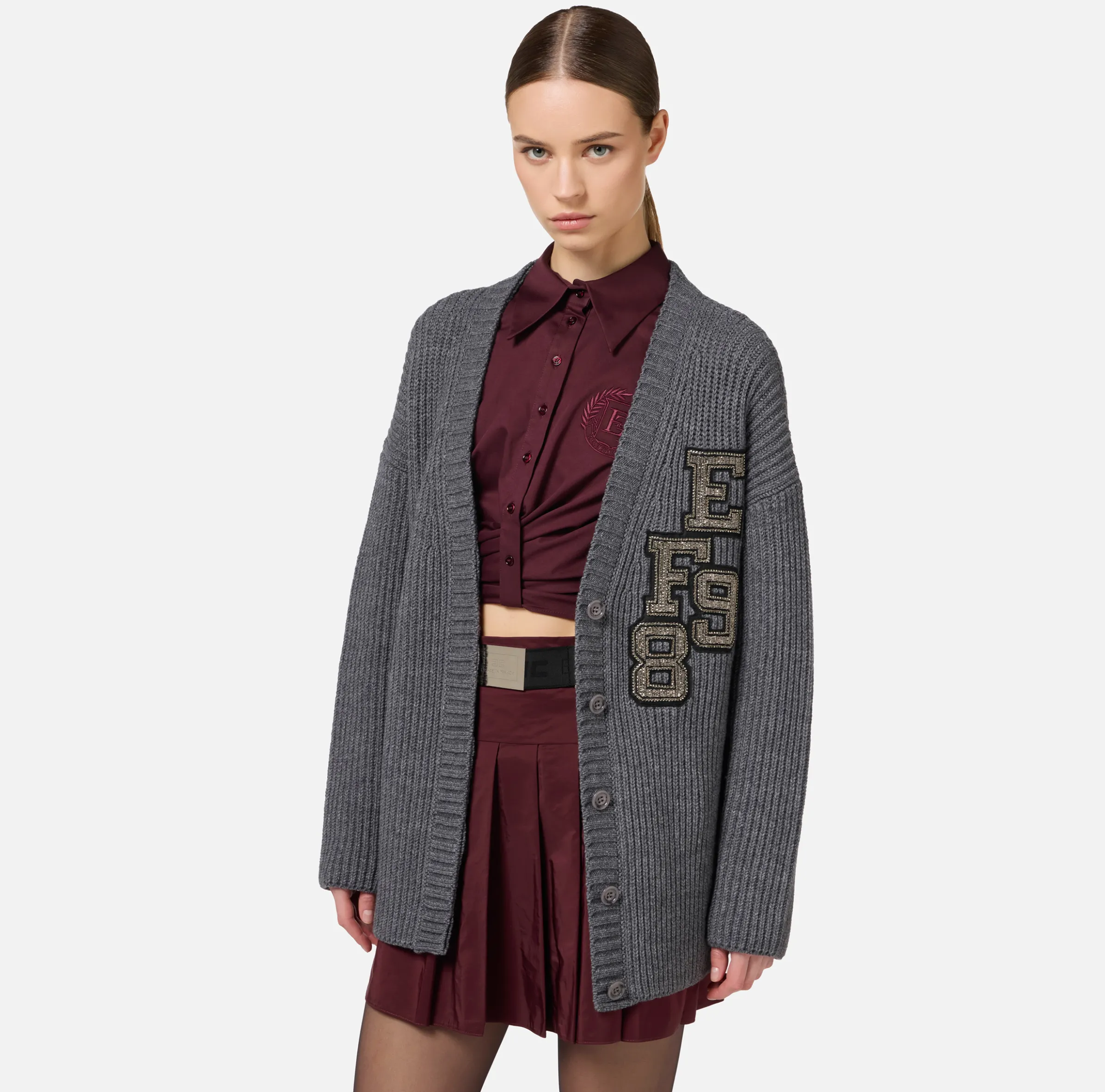 Cardigan in lana costa inglese con patch logo