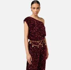 Cintura catena in metallo dorato con charms borse