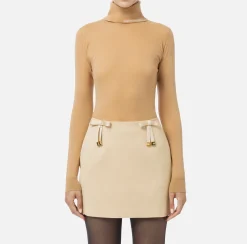 Dolcevita in lana merino con logo jacquard