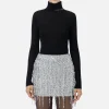 Dolcevita in lana merino con logo jacquard