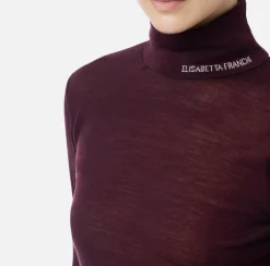 Dolcevita in lana merino con logo jacquard
