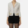 Giacca cropped in crêpe stretch stampa rombo con catena