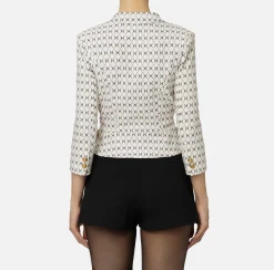 Giacca cropped in crêpe stretch stampa rombo con catena