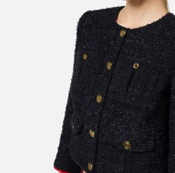 Giacca cropped in tweed con tasche