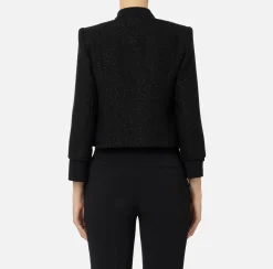 Giacca cropped in tweed laminato con tasche