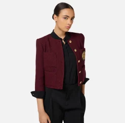 Giacca cropped in tweed laminato con tasche