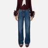 Jeans a gamba larga in cotone organico con bande in raso