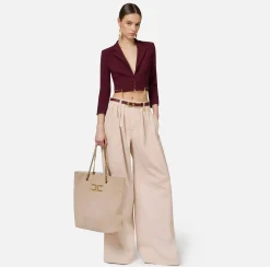 Jeans a gamba larga in cotone tinto con pinces