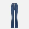 Jeans a zampa in cotone stretch con bottoniera centrale