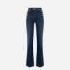 Jeans a zampa in cotone stretch con bottoniera laterale