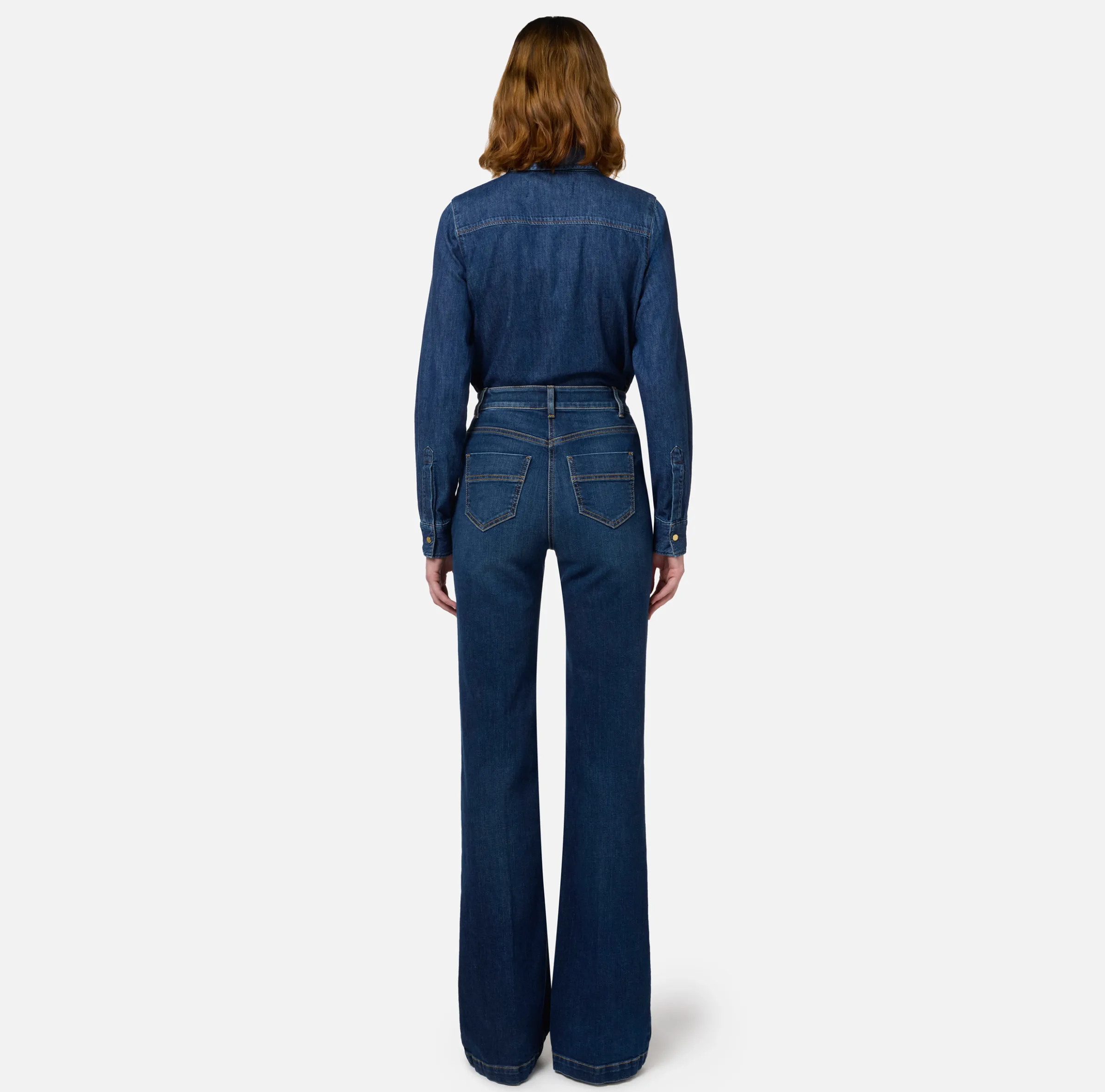 Jeans a zampa in cotone stretch con bottoniera laterale