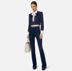 Jeans dritto in cotone stretch con placche logo