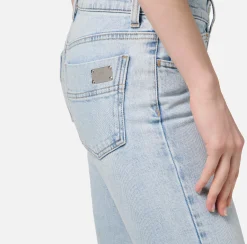 Jeans skinny in cotone stretch con placca logo
