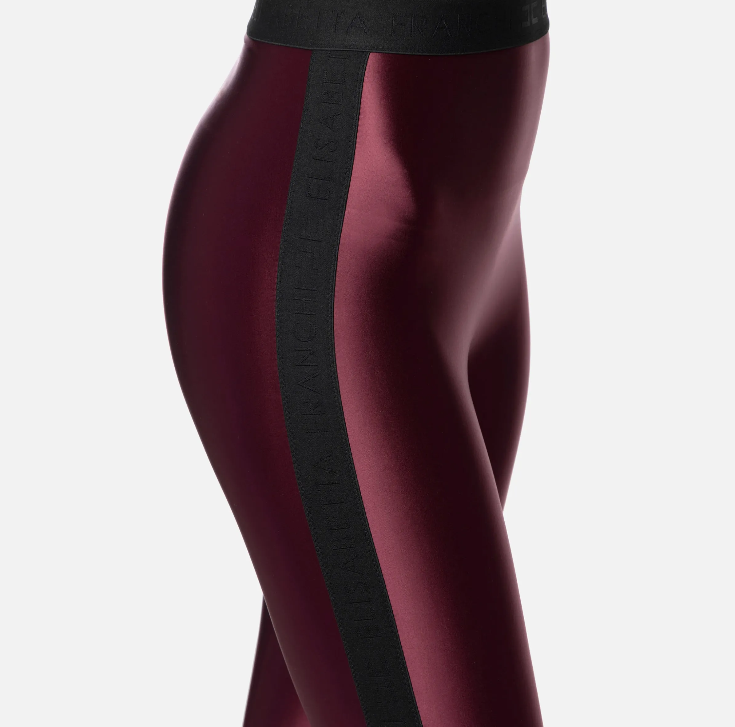 Leggings in lycra lucida con elastico logato