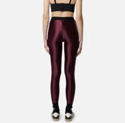 Leggings in lycra lucida con elastico logato