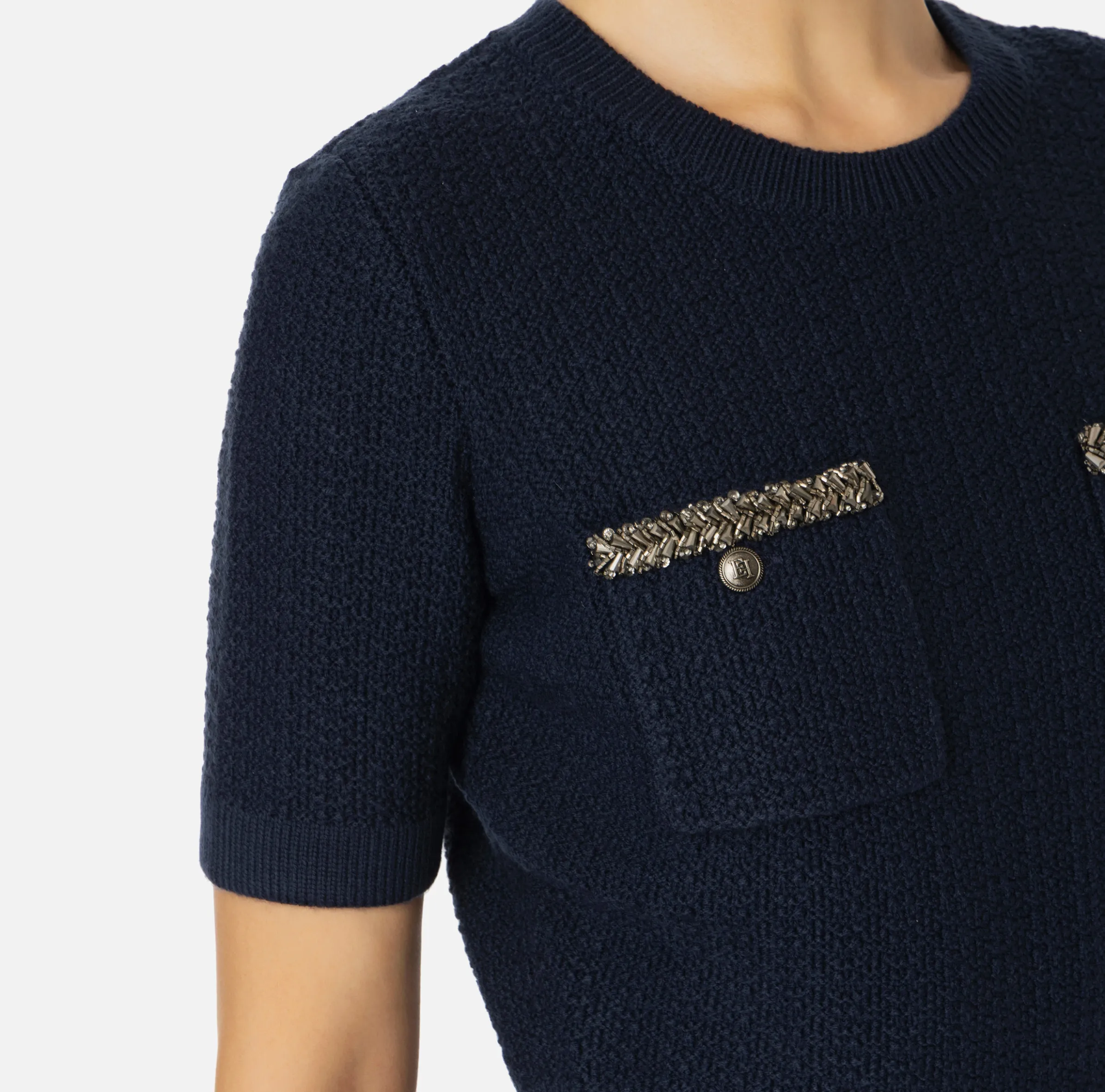 Maglia cropped in lana bouclé con ricamo
