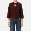 Maglia cropped in viscosa con patch logo