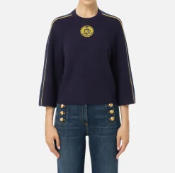 Maglia cropped in viscosa con patch logo