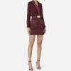 Miniabito con camicia incrociata e gonna con tasche