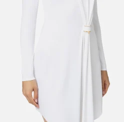 Miniabito in jersey con drappeggio e accessorio gioiello