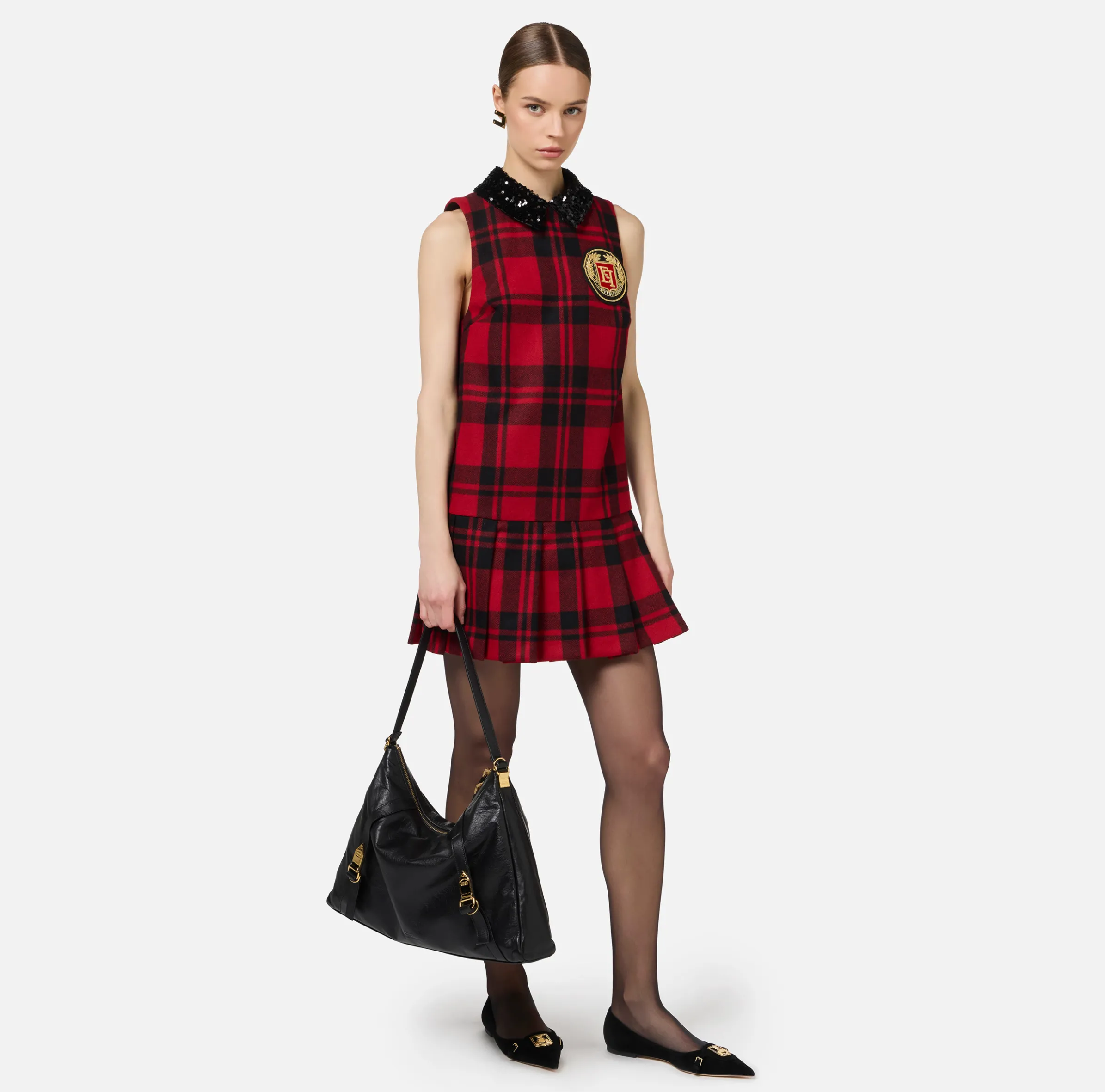 Miniabito in lana tartan con patch ricamato