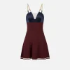 Miniabito in satin con catena groumette