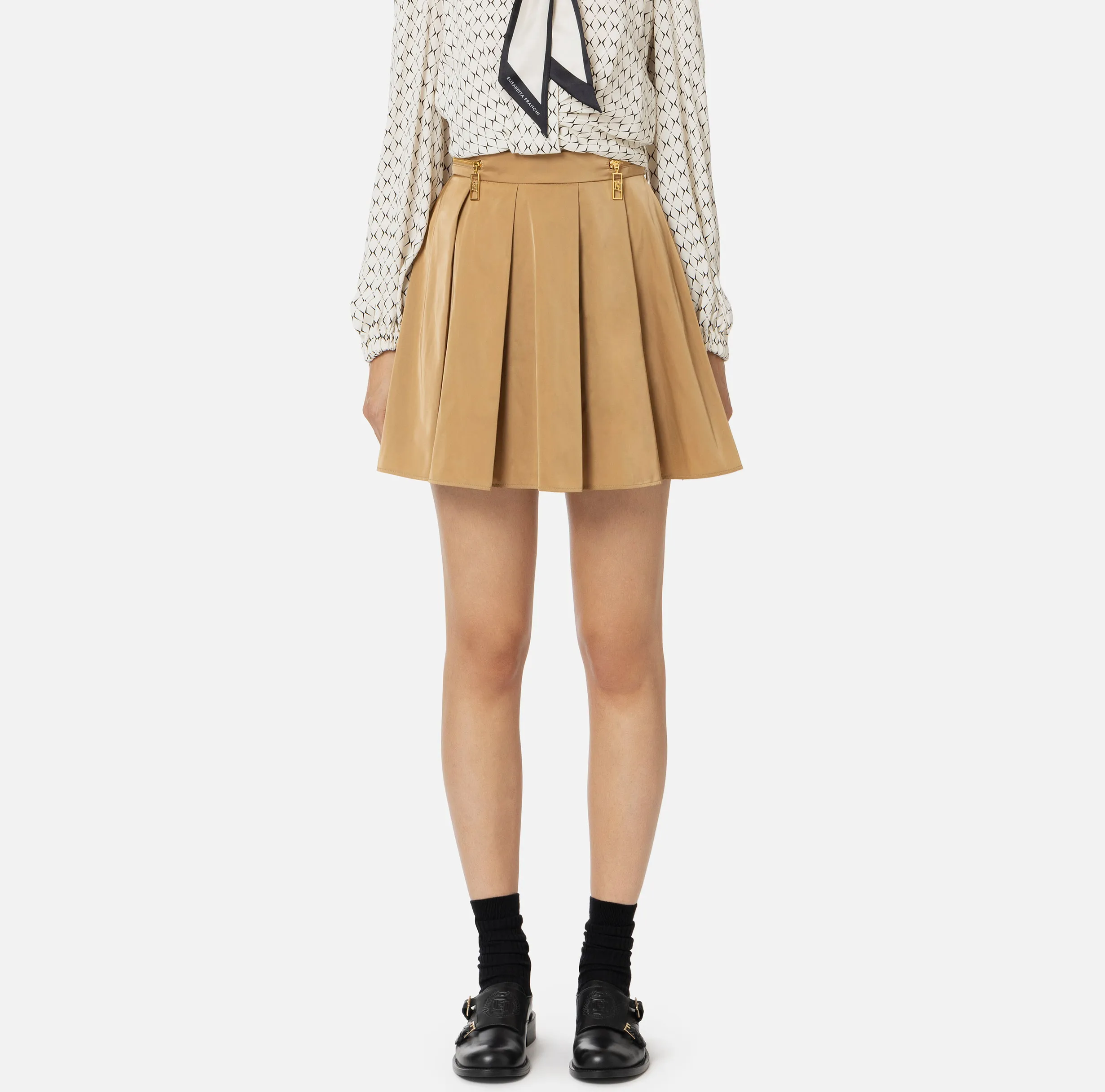 Minigonna a pieghe in nylon tecnico con zip