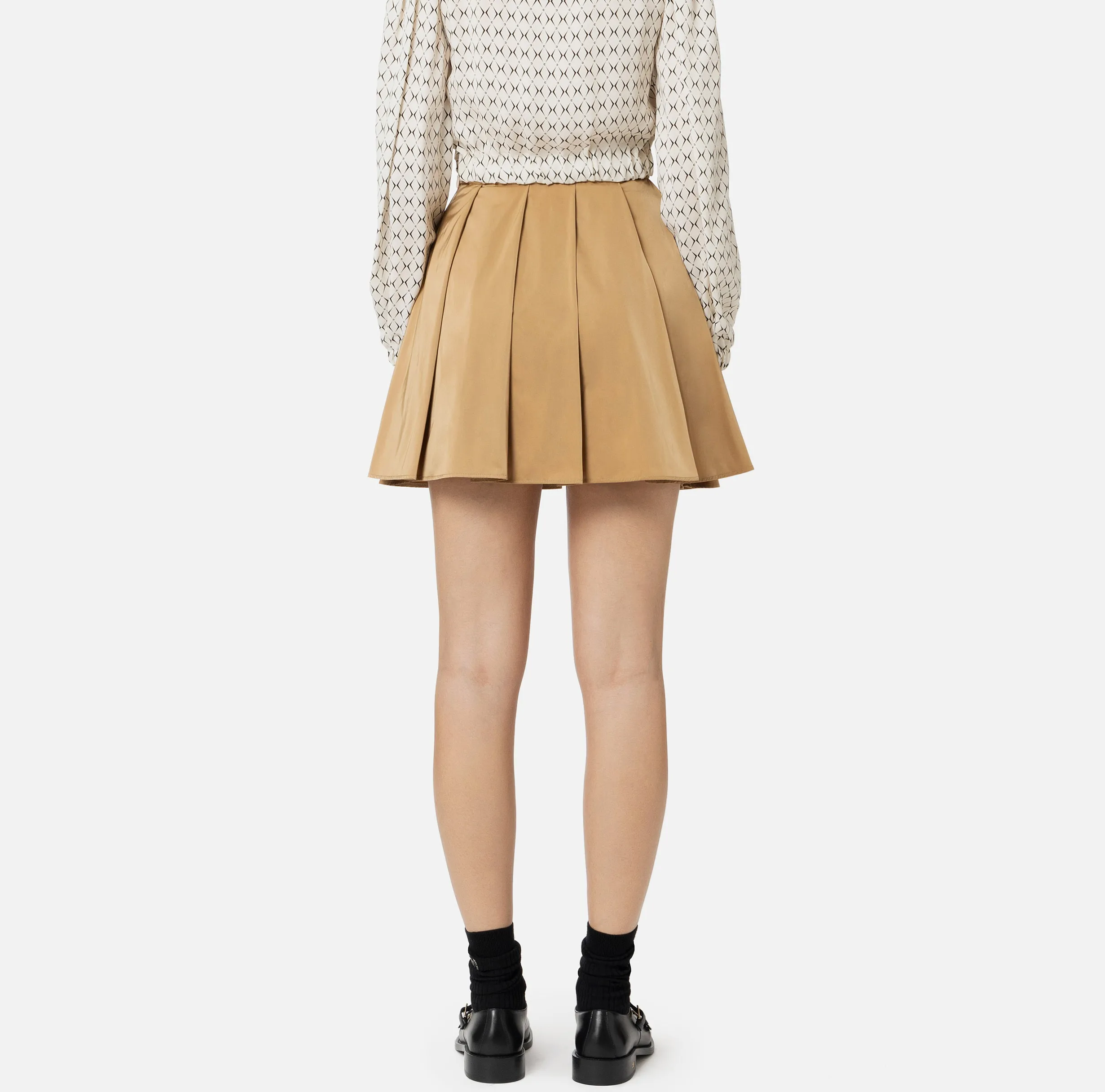 Minigonna a pieghe in nylon tecnico con zip