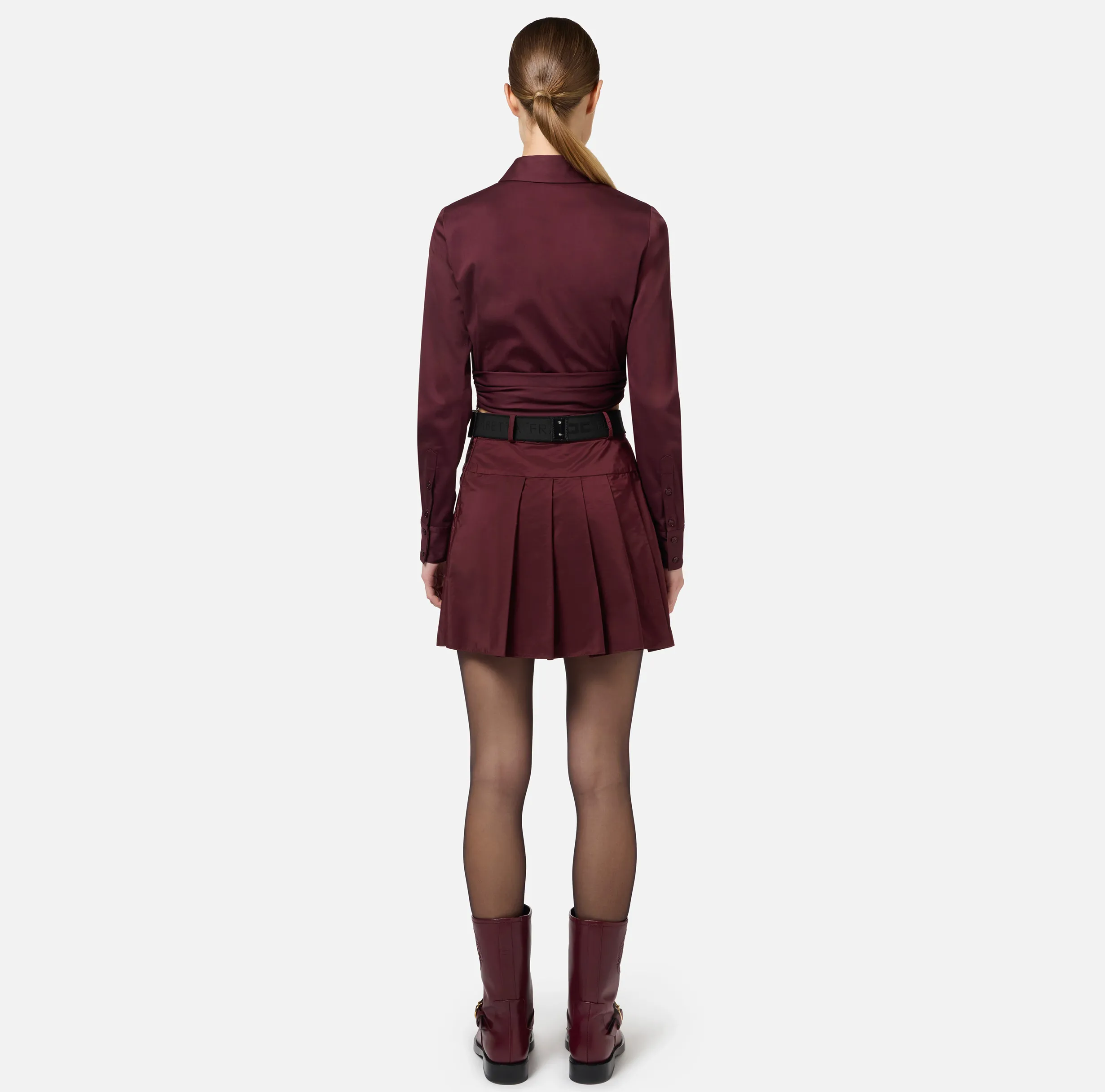 Minigonna a pieghe in nylon tecnico con zip