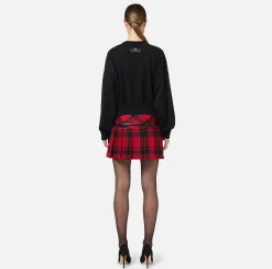 Minigonna a pieghe in tartan di lana