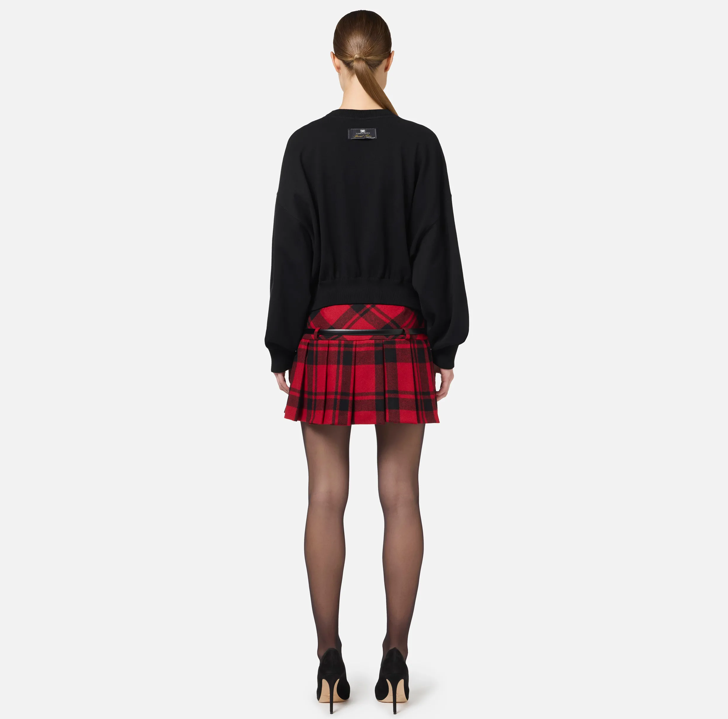 Minigonna a pieghe in tartan di lana
