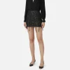 Minigonna in tulle ricamata con frange di paillettes