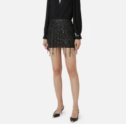 Minigonna in tulle ricamata con frange di paillettes