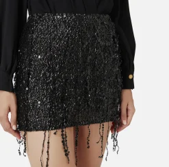 Minigonna in tulle ricamata con frange di paillettes