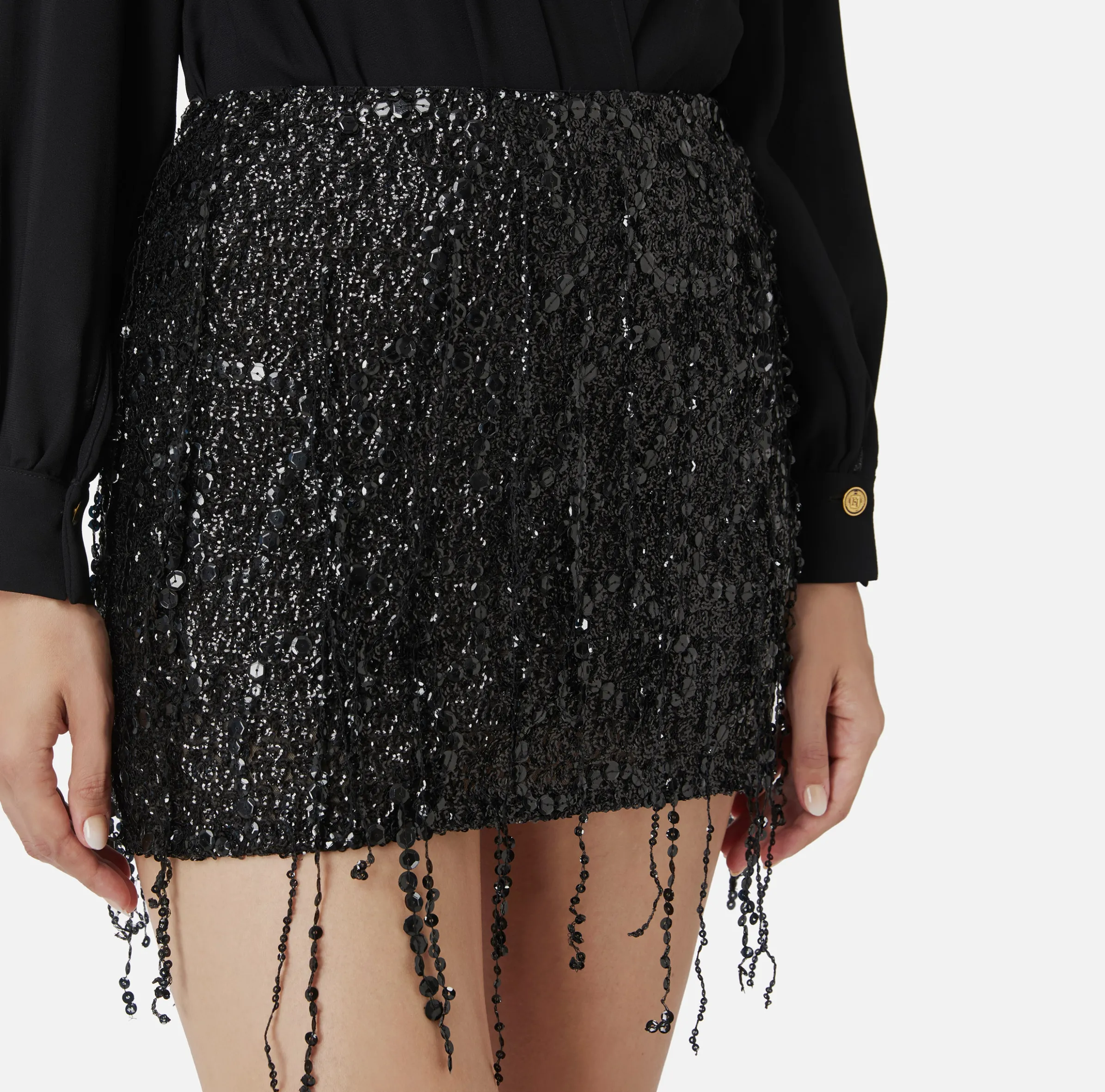 Minigonna in tulle ricamata con frange di paillettes