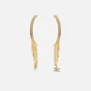 Orecchini a semicerchio in metallo dorato con charms