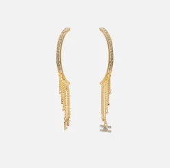 Orecchini a semicerchio in metallo dorato con charms