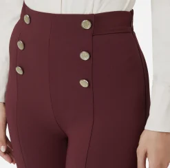 Pantalone a zampa in crêpe con fascione in raso