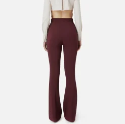 Pantalone a zampa in crêpe con fascione in raso