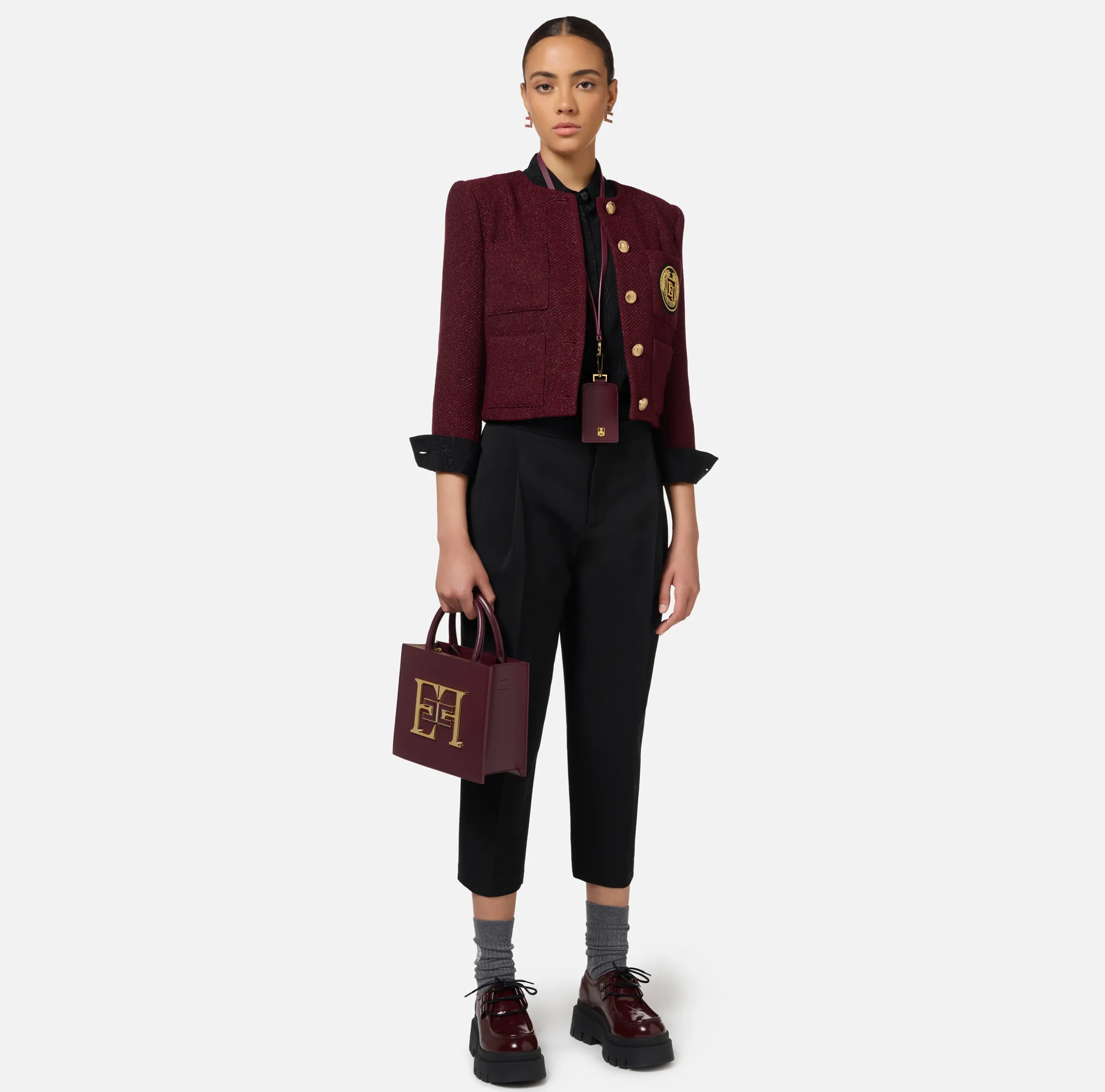Pantalone cropped in fresco di lana stretch con pinces