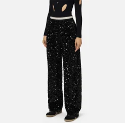 Pantalone in ciniglia ricamata con paillettes
