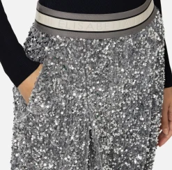 Pantalone in ciniglia ricamata con paillettes