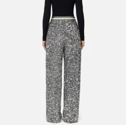 Pantalone in ciniglia ricamata con paillettes